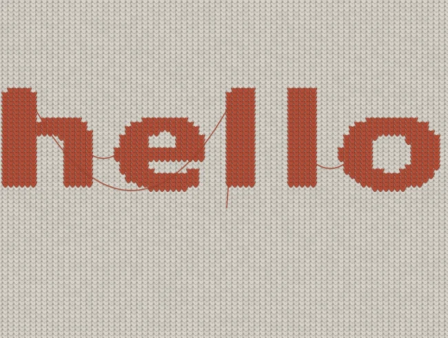 毛衣打字机里由针脚组成的 hello 文字